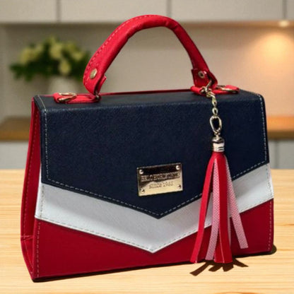 Bolsa BERNARDINA Crossbody Tricolor Beige Blanco y Negro con Tassel – Mini Tote Elegante y Moderno