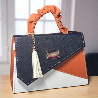 Bolsa CANDELA  Crossbody Tricolor Negro Naranja y Blanco con Tassel – Mini Tote Moderno y Elegante