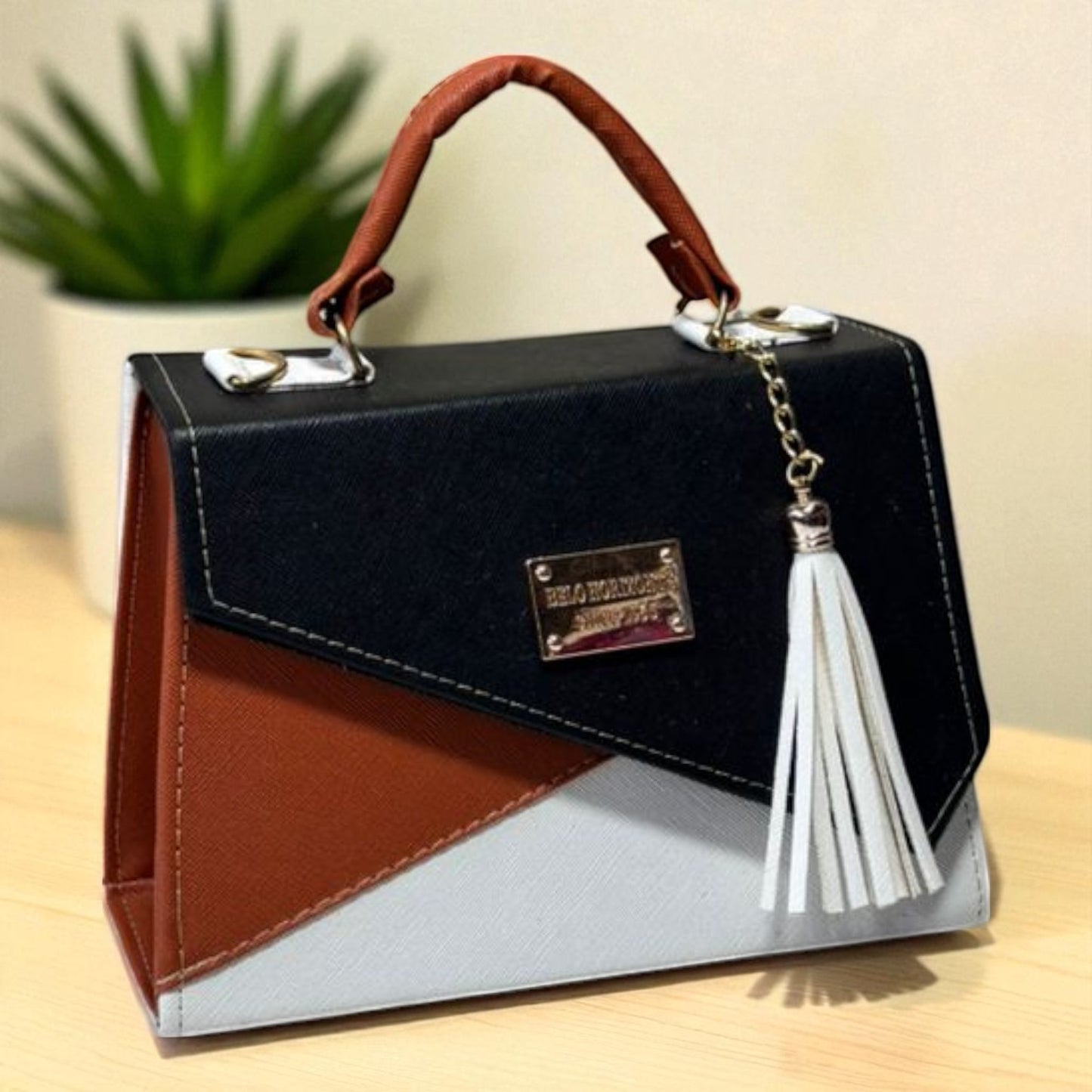 Bolsa CANDELA  Crossbody Tricolor Negro Naranja y Blanco con Tassel – Mini Tote Moderno y Elegante