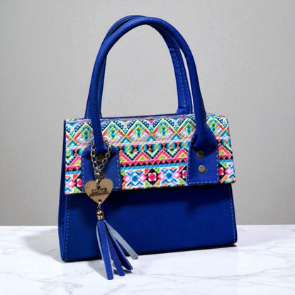 Bolsa DOMINGA Crossbody Artesanal Rosa con Bordado Multicolor y Tassel – Mini Tote Mexicano de Moda