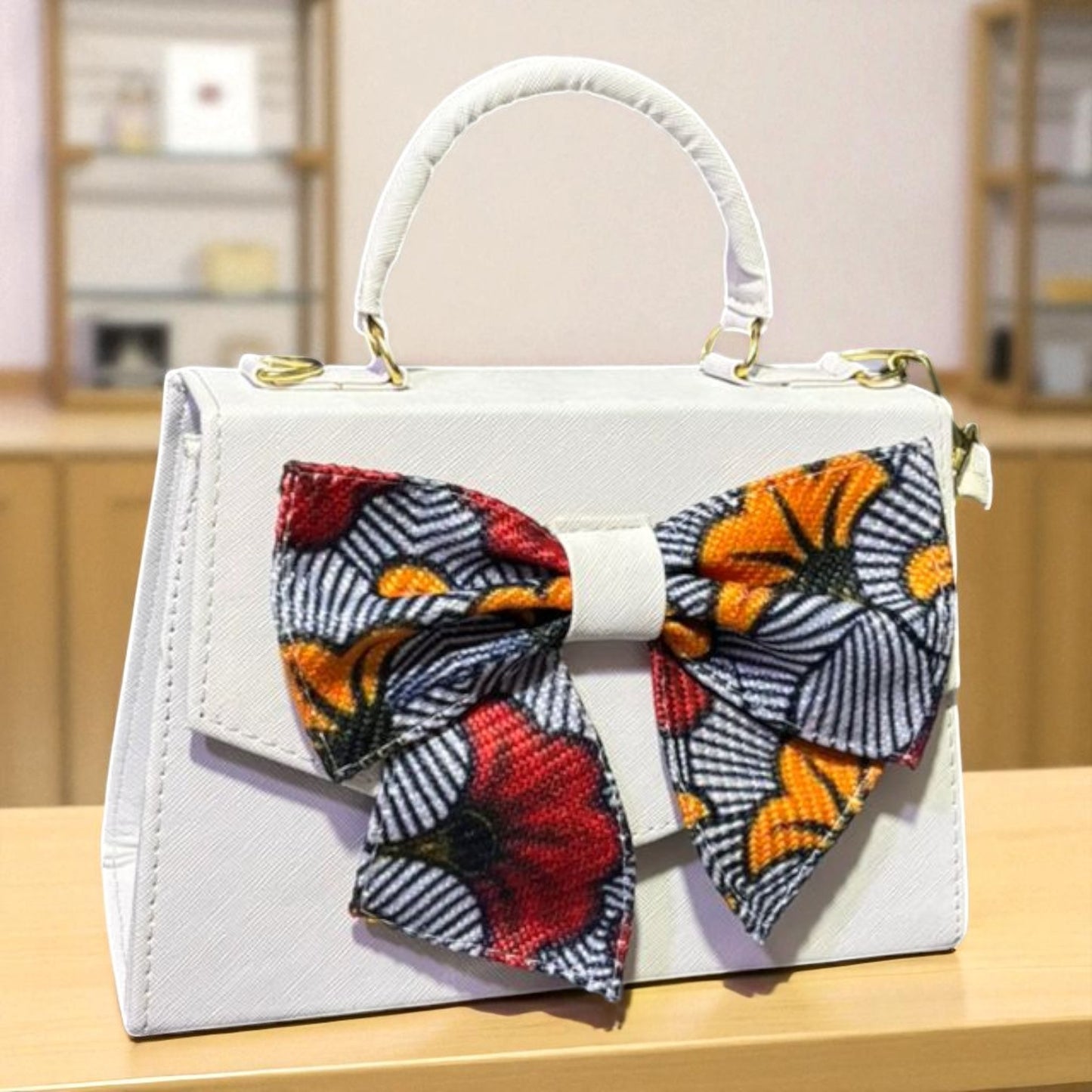 Bolsa FAUSTINA Crossbody Negra con Moño de Girasoles – Mini Tote Artesanal Moderno