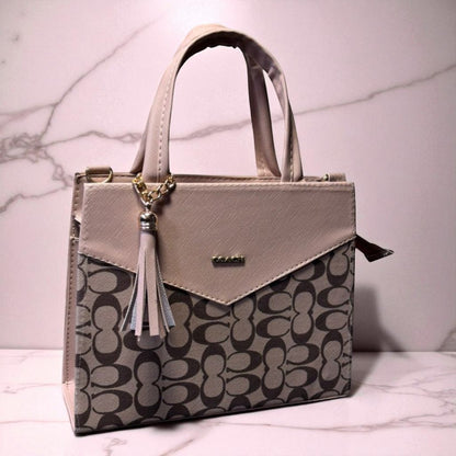 Bolsa KARLY Mediana Estilo  con Asa de Mano y Borla – Elegancia y Versatilidad para Toda Ocasión