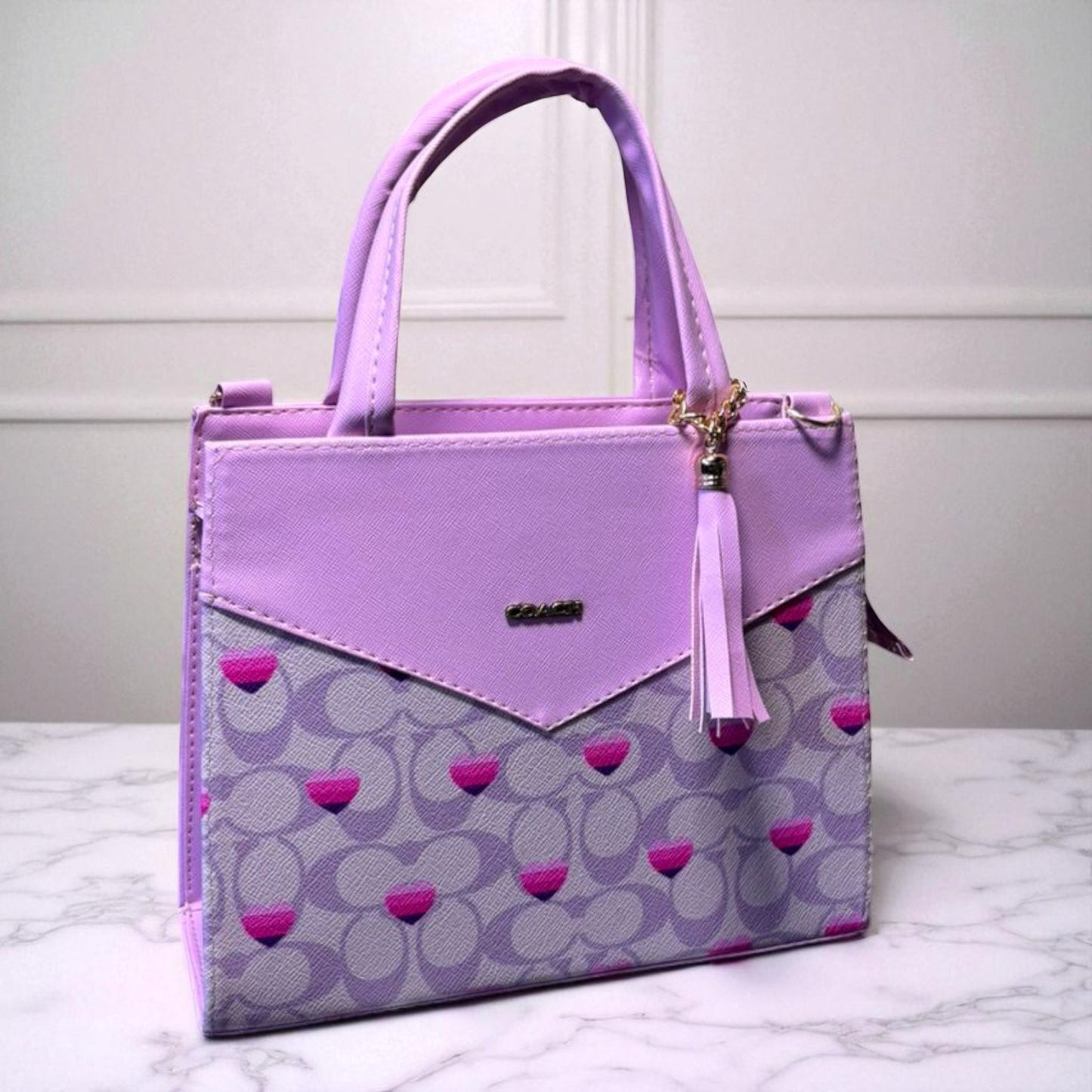 Bolsa KARLY Mediana Estilo  con Asa de Mano y Borla – Elegancia y Versatilidad para Toda Ocasión