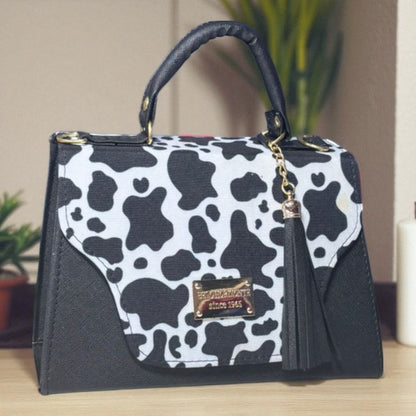 Bolsa NORMA Crossbody Negra Holográfica Geométrica con Borla – Juvenil, Moderna y Elegante, Ideal para Revender y Ganar el Triple