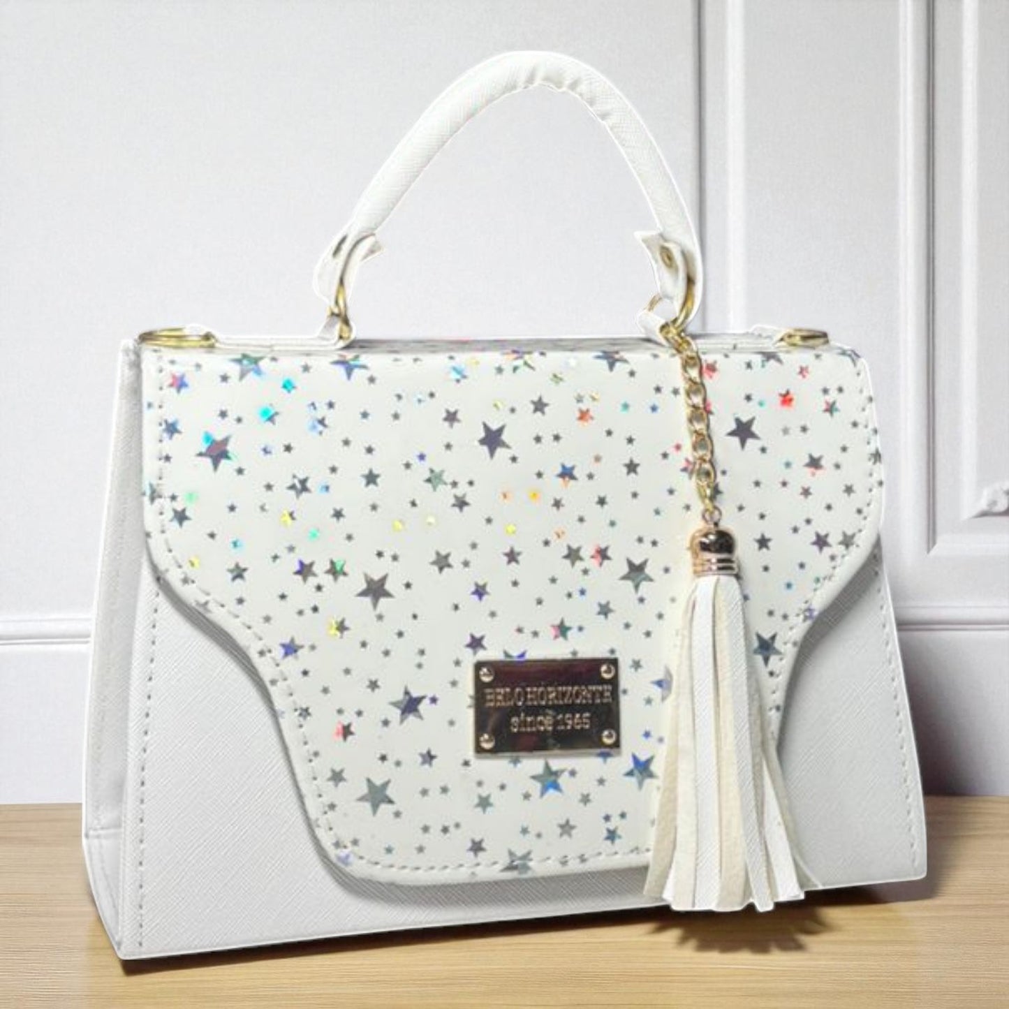 Bolsa NORMA Crossbody Negra Holográfica Geométrica con Borla – Juvenil, Moderna y Elegante, Ideal para Revender y Ganar el Triple