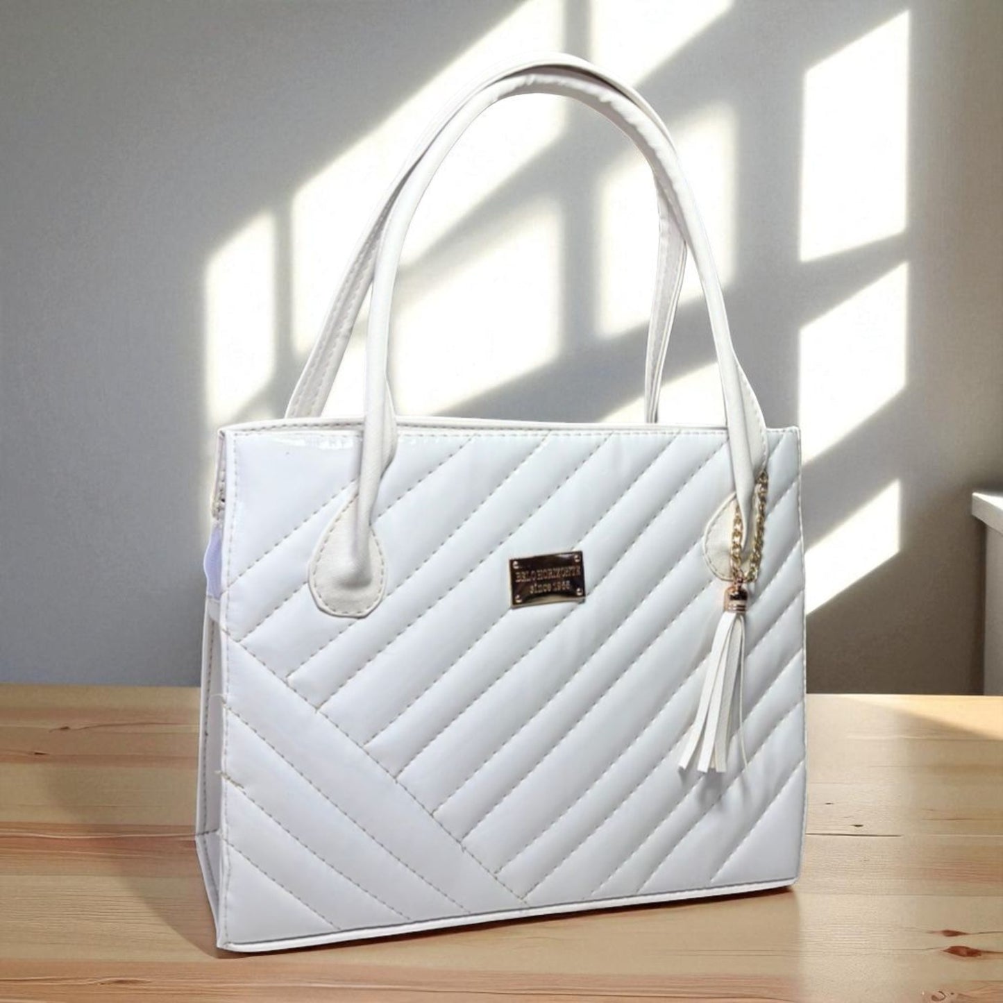 Bolsa de dama OLGA metálica elegante color oro rosa con haza larga hombro