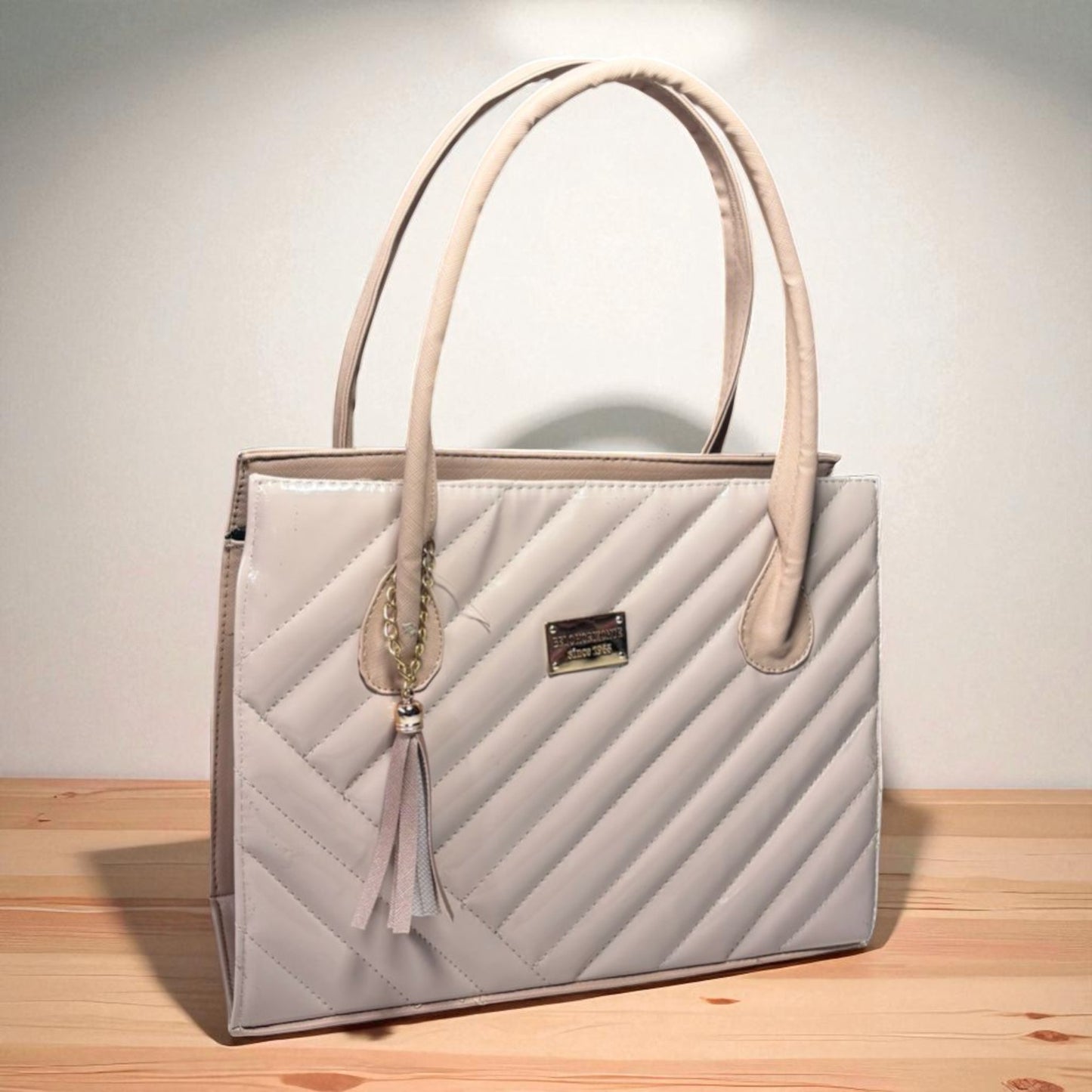 Bolsa de dama OLGA metálica elegante color oro rosa con haza larga hombro