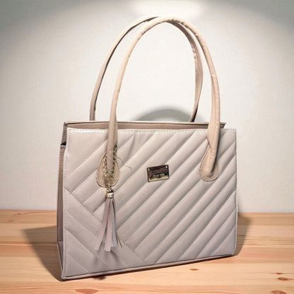 Bolsa de dama OLGA metálica elegante color oro rosa con haza larga hombro