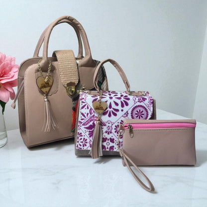 Trio de bolsas consta de Mediana , Mini y Cosmetiquera de material sintetico de alta calidad
