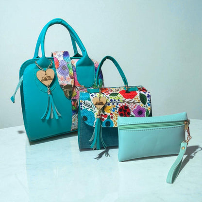 Trio de bolsas consta de Mediana , Mini y Cosmetiquera de material sintetico de alta calidad