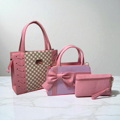 Trio de bolsas consta de Mediana , Mini y Cosmetiquera de material sintetico de alta calidad