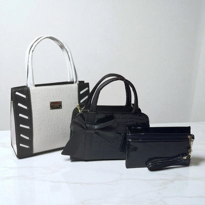 Trio de bolsas consta de Mediana , Mini y Cosmetiquera de material sintetico de alta calidad