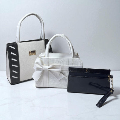 Trio de bolsas consta de Mediana , Mini y Cosmetiquera de material sintetico de alta calidad