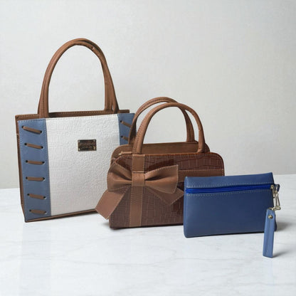 Trio de bolsas consta de Mediana , Mini y Cosmetiquera de material sintetico de alta calidad